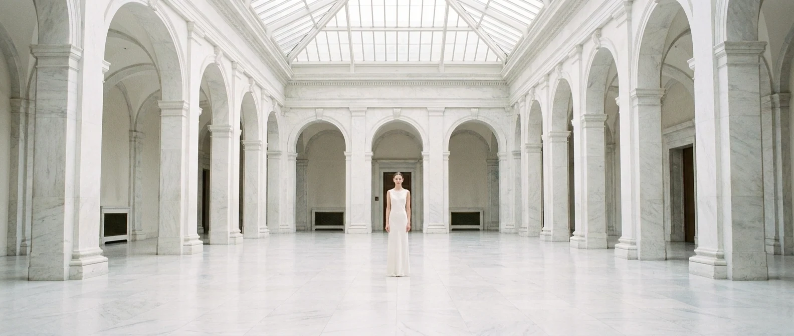 Silk column gown — Bias-cut ivory silk, beaded neckline